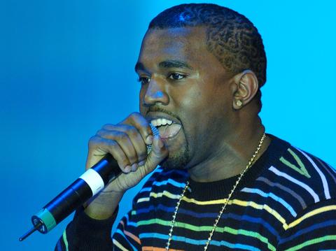 Kanye West performs gallery painting