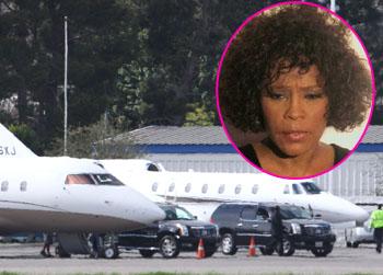 //whitney houston body private plane inf