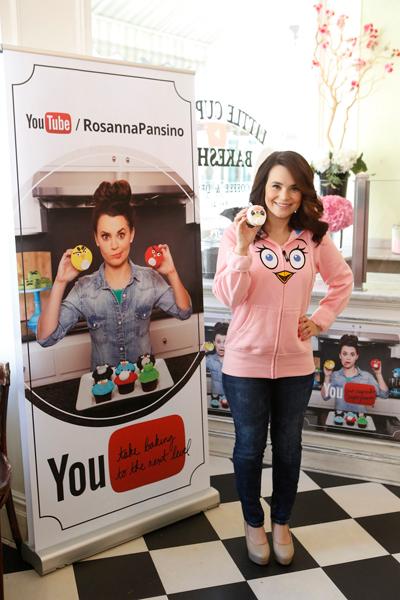 //rosanna pansino infront of the youtube sign at the little cupcake bakeshop youtube angry birds event