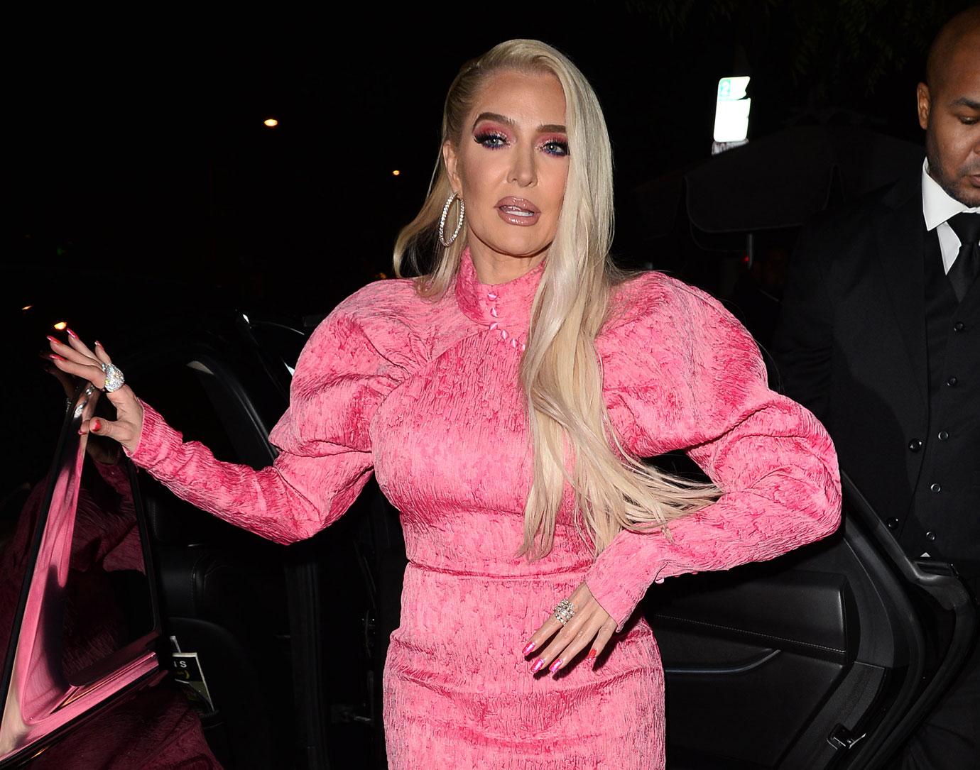 erika jayne photos unrecognizable explosive rhobh dinner holding atm card embezzelement investigation