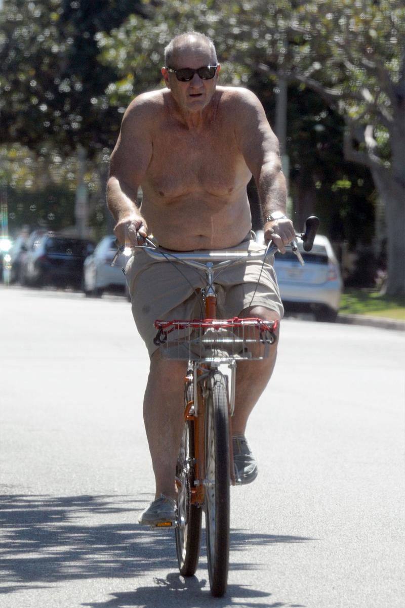 //ed o neill shirtless weight bike ride