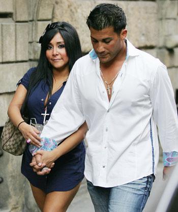 Snooki flaunts her $1,500 designer bag as she and boyfriend Jionni arrive  in LA