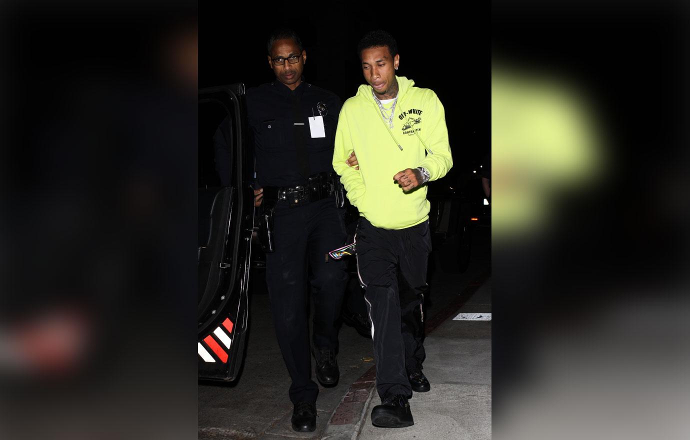 //kylie jenner purple boots ex tyga handcuffed