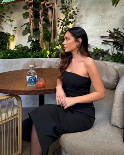 marianna hewitt enjoys an astral tequila cocktail to celebrate the launch of her curated collection with revolve in los angeles