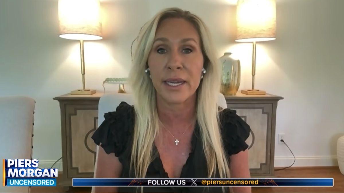 image of Greene claimed Trump blamed her as threats escalated to one of her children.