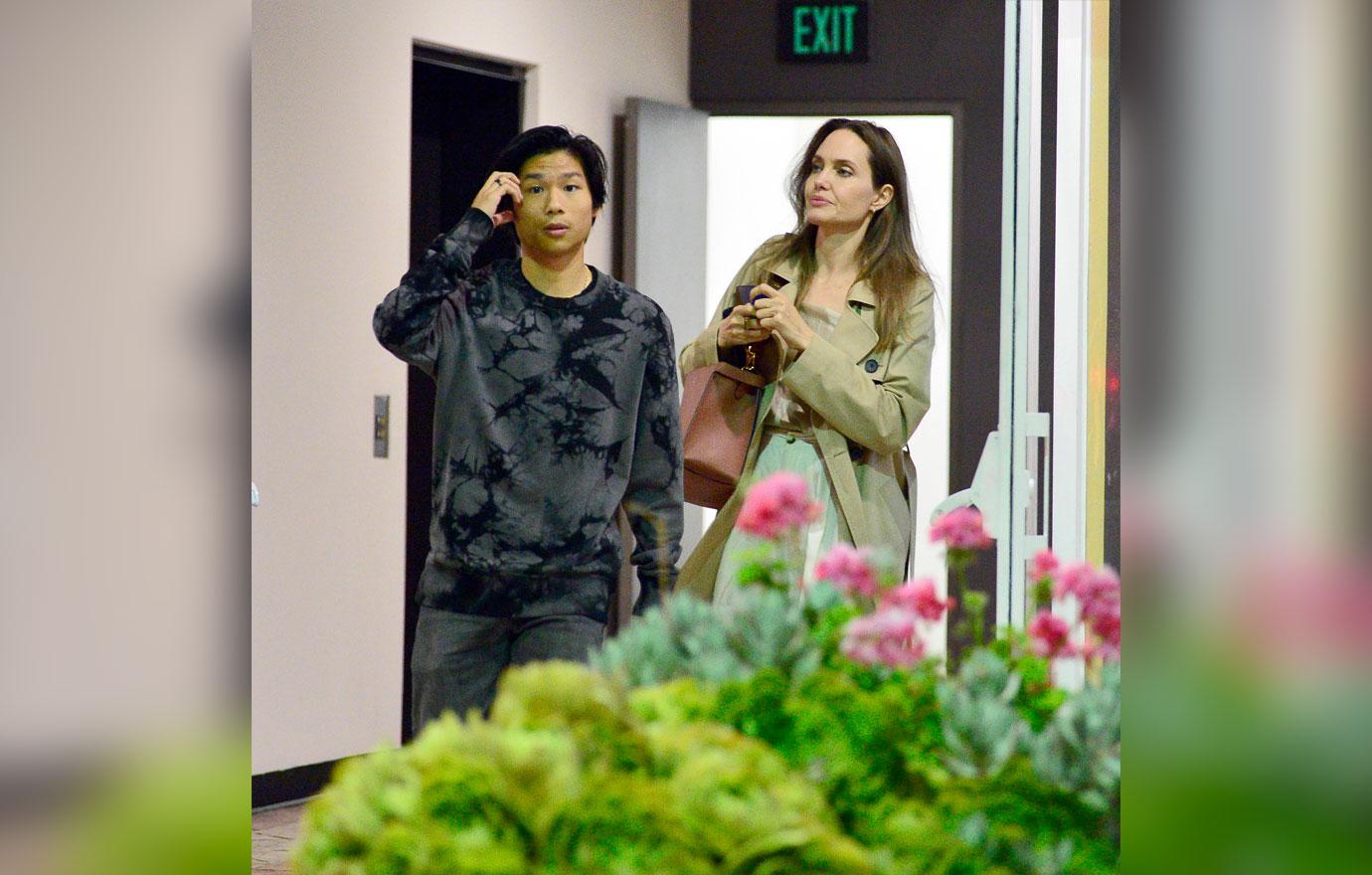 A make up free Angelina Jolie spends the night with her son Pax as they leave sushi park restaurant in West Hollywood.