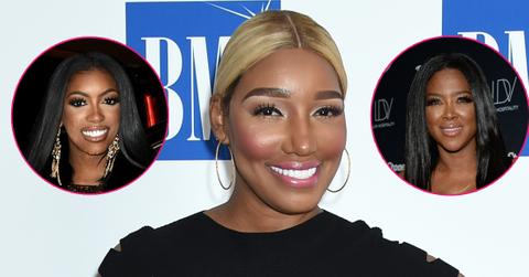 Nene Leakes wears a black one piece, center; Kenya Moore, right; Porsha williams, left.