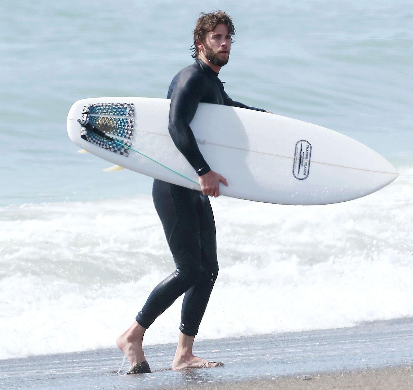 Liam Hemsworth Surfing Malibu Pics