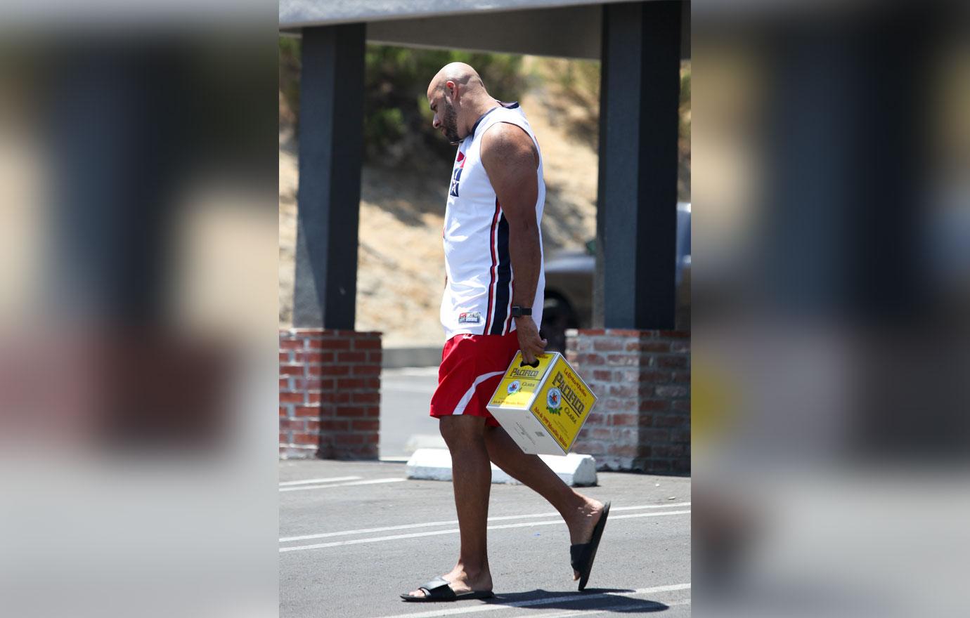 Hank Baskett Buying Booze Divorce