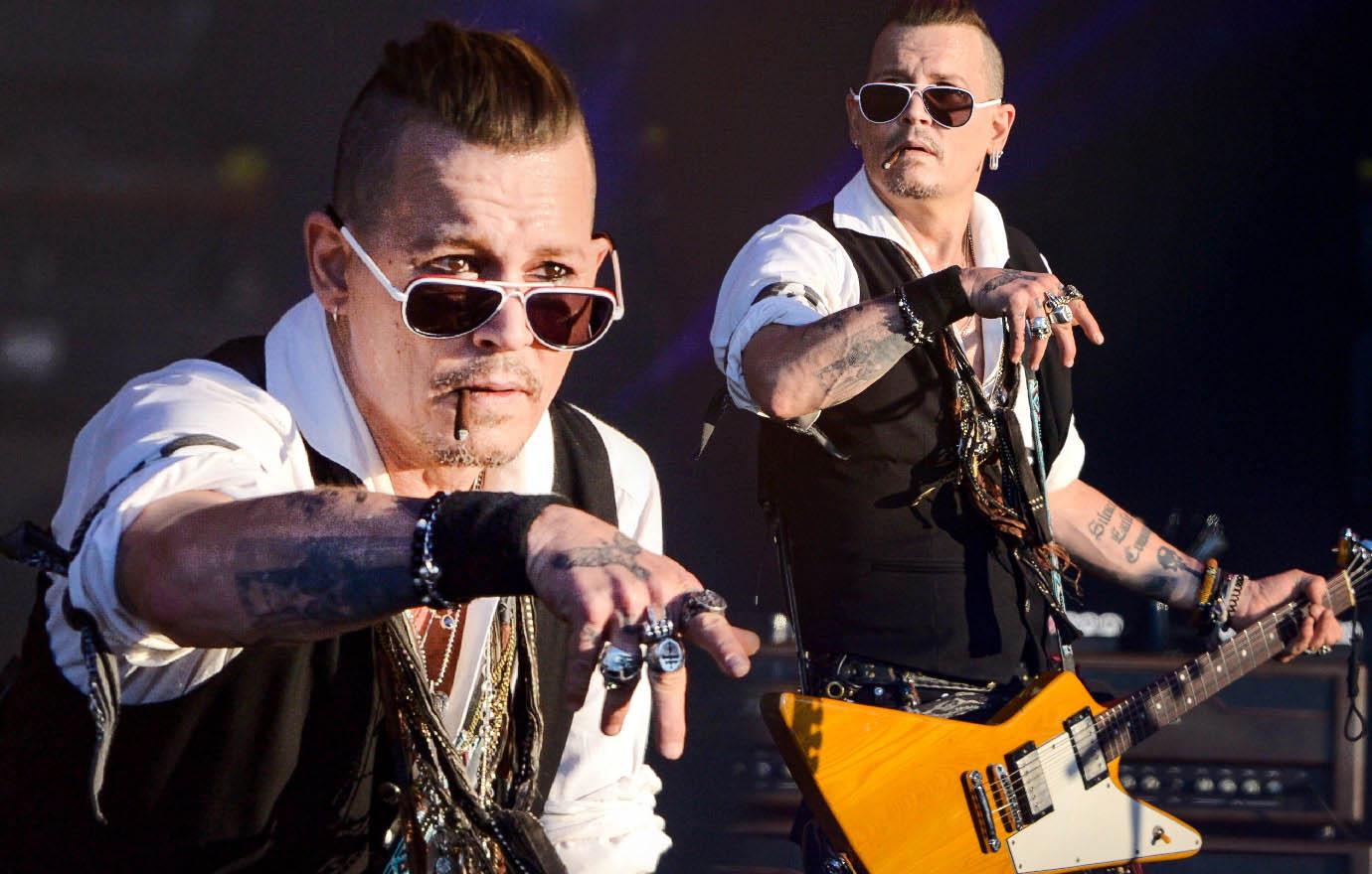 Johnny Depp Performs After Booze Bender Revelations