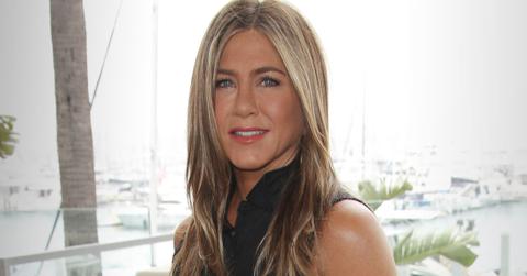 Jennifer Aniston Smiling Wearing Black Sleeveless Dress