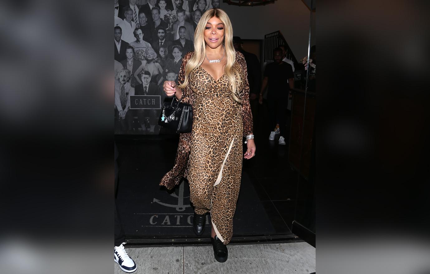 Wendy Williams Dines At Restaurant In Leopard Print Dress