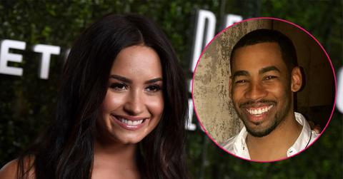 Main, Demi Lovato smiling at an event. Inset, Mike Johnson .