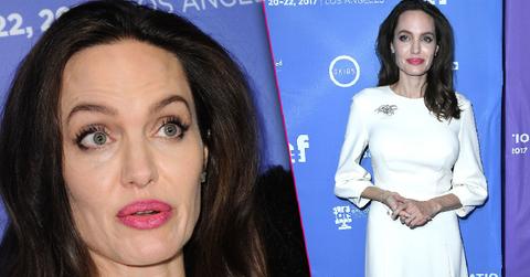 //angelina jolie scary skinny in white gown red carpet premiere