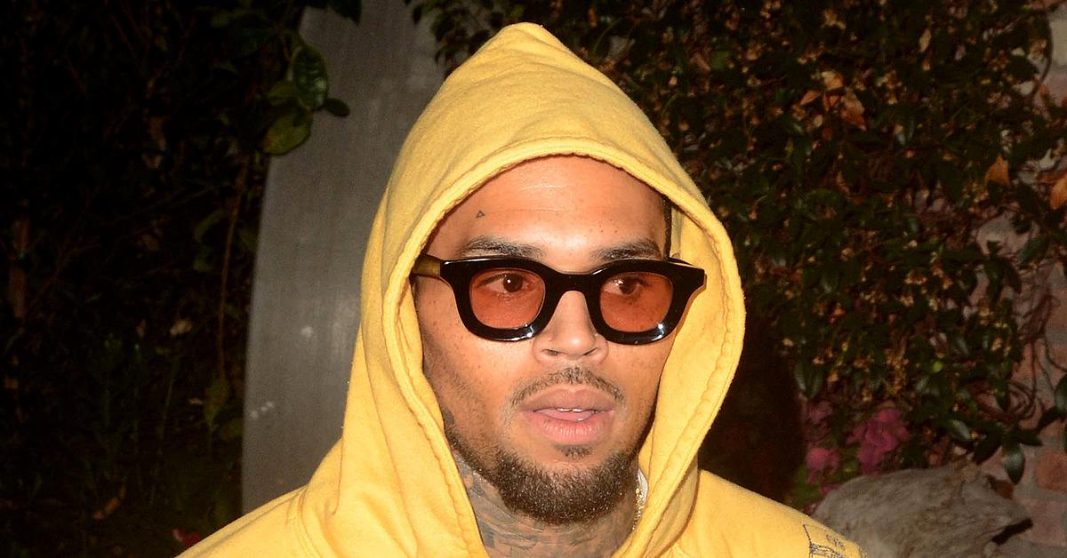 chris brown no charges battery la mansion woman weave smacked off