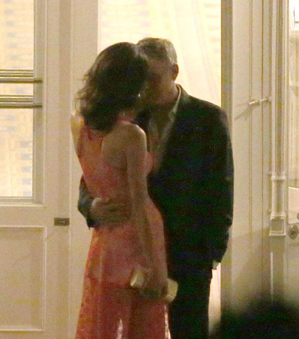 //george clooney amal clooney dinner italy kiss hold hands