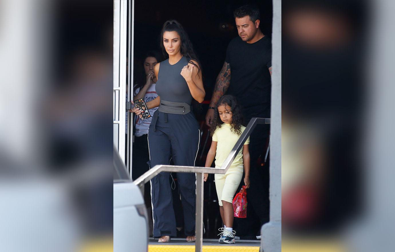 Kim Kardashian goes bowling in skintight leather pants at Bowlmore Lanes
