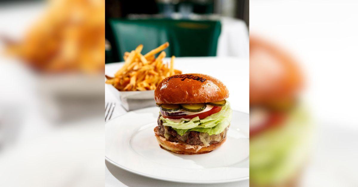 photo of cheeseburger and fries
