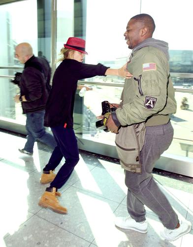 Cara Delevingne Goes Crazy At Heathrow Airport Chasing Photographers