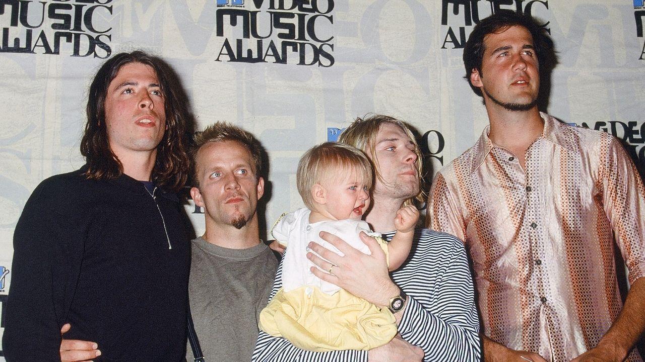 Photo of Dave Grohl,Krist Novoselic, Chad Channing, Frances Bean Cobain and Kurt Cobain