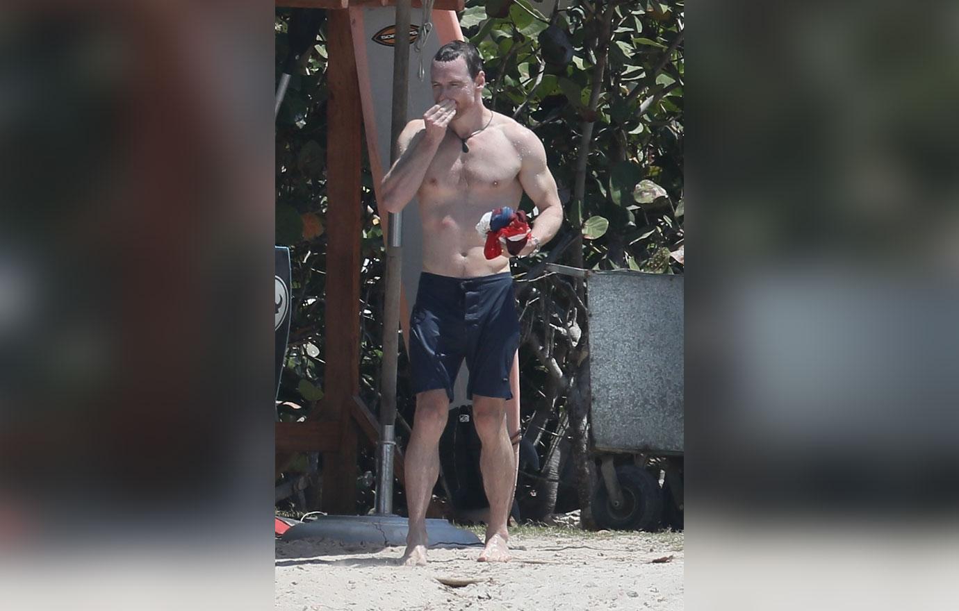 A Shirtless Michael Fassbender Shows Off Abs At The Beach