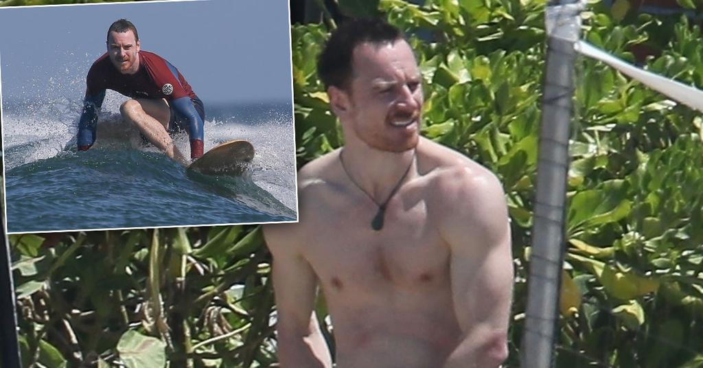 A Shirtless Michael Fassbender Shows Off Abs At The Beach 
