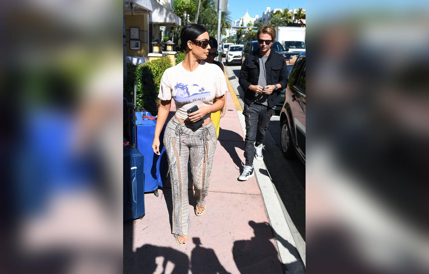 Kim and Kourtney Kardashian out in Miami in a green Rolls Royce with Jonathan Cheban