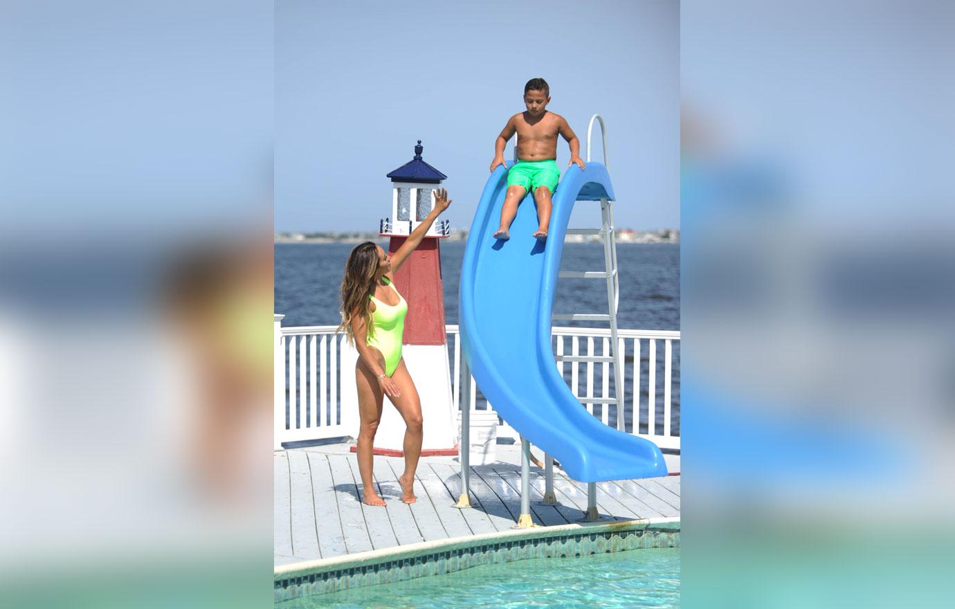 Melissa Gorga Enjoys Pool Day With Son In Neon Swimsuit