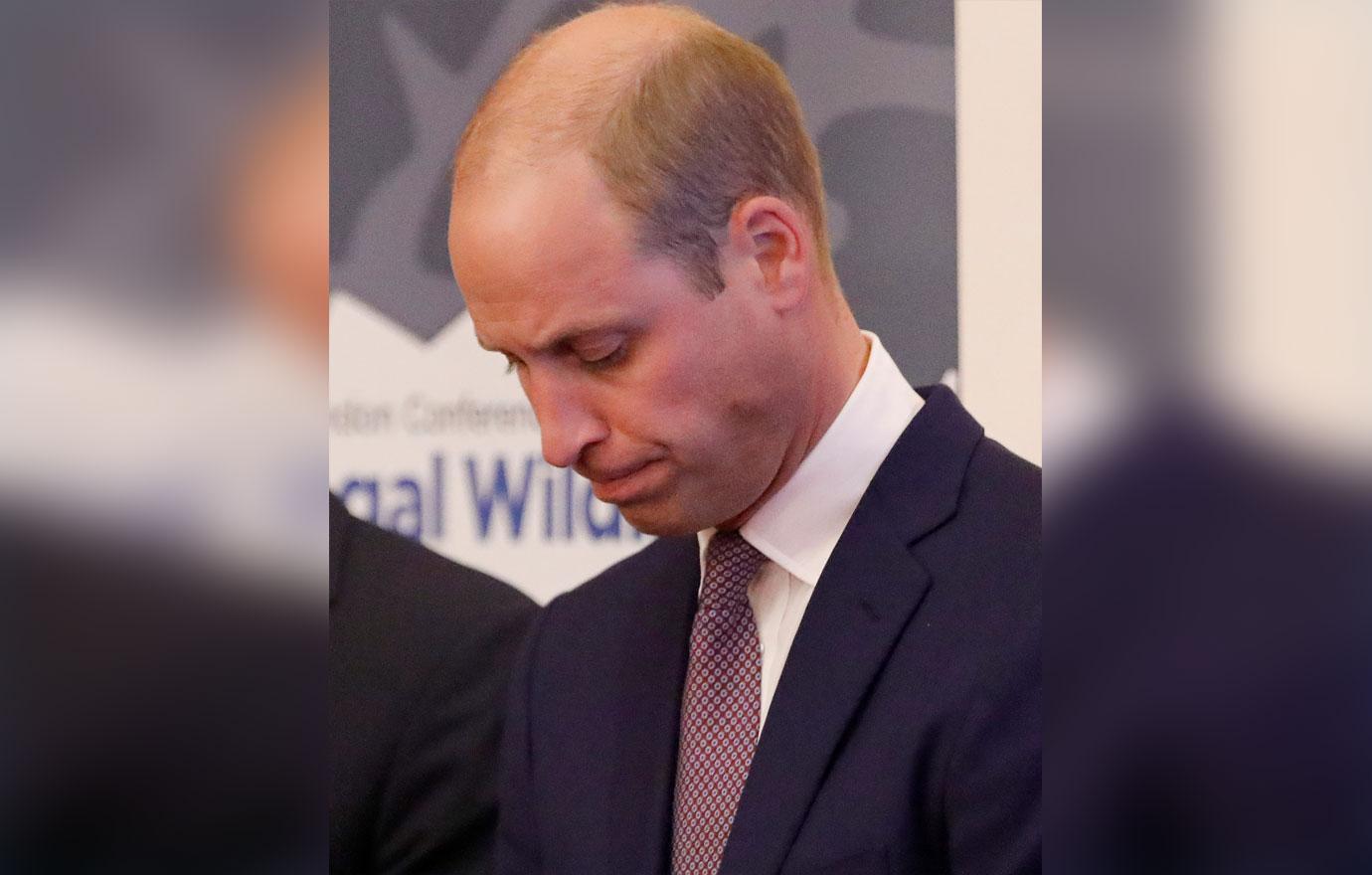 Glum Looking Prince William Wearing Dark Suit Light Shirt and Purple Tie