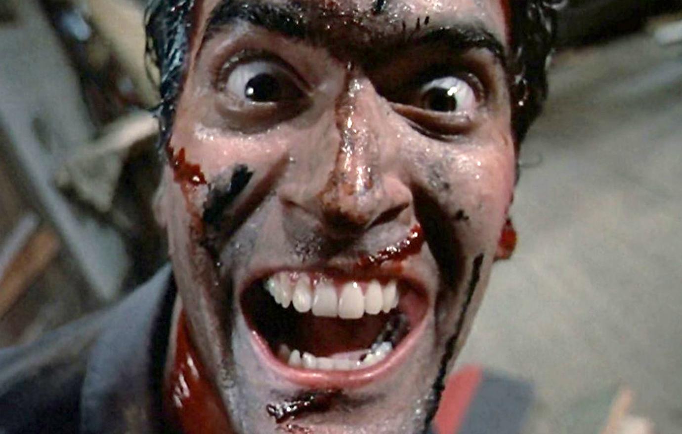 Bruce Campbell starred as Ash and in this still, was just a little pumped after killing a swath of zombies that left his face scarred and bloody.