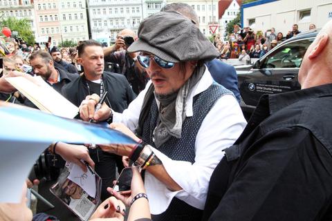 amber heard wine photos johnny depp film festival fans canceled million defamation