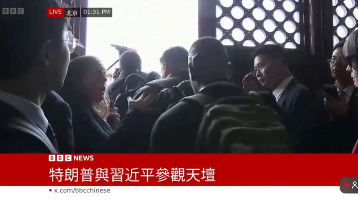Members of the Chinese Media bowled over a White House aide.