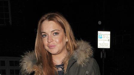 //lindsay lohan police escort