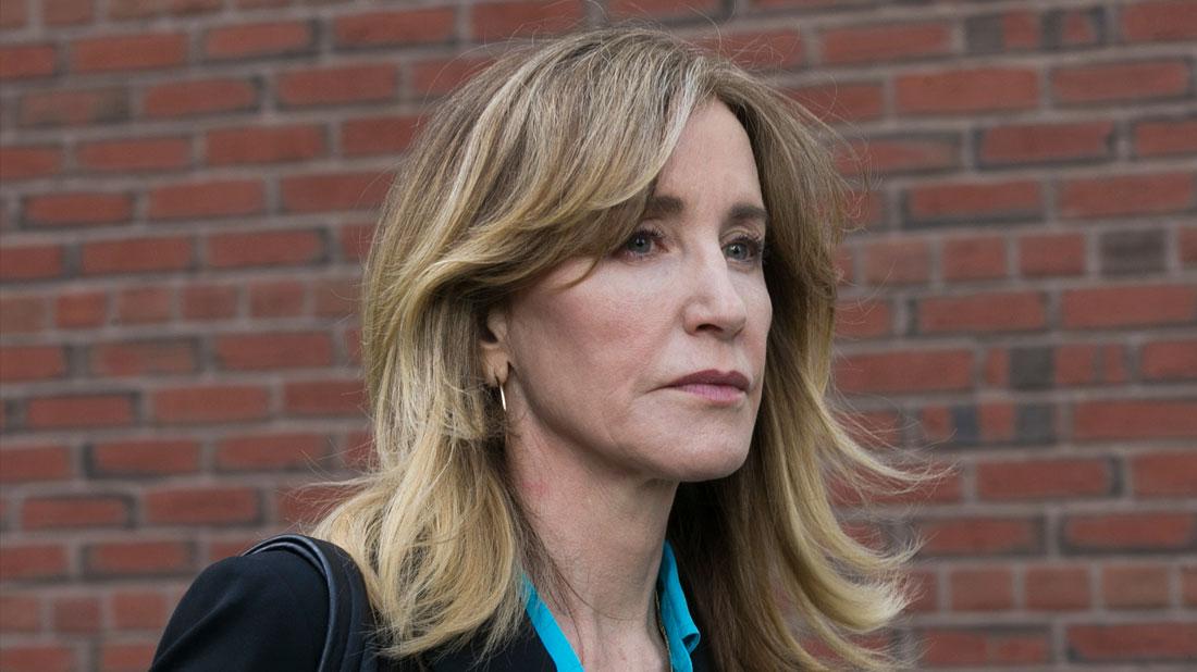 US actress Felicity Huffman leaves the John J Moakley Federal Court House after facing charges in a nationwide college admissions cheating scheme in Boston, Massachusetts.