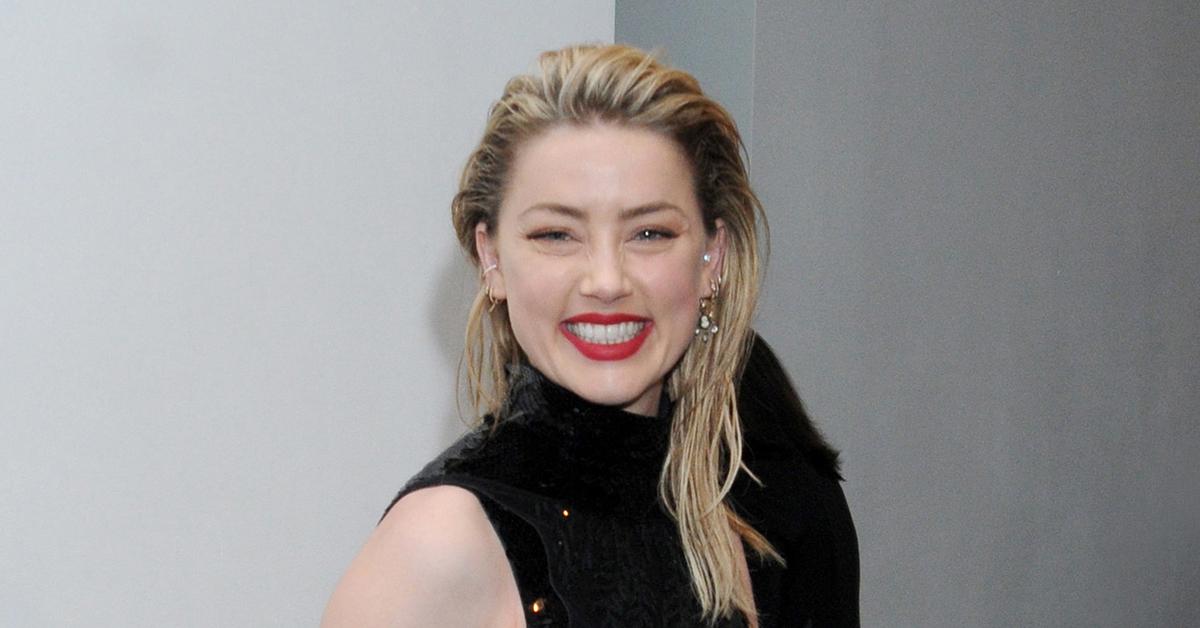 amber heard tell all book bidding war  million johnny depp