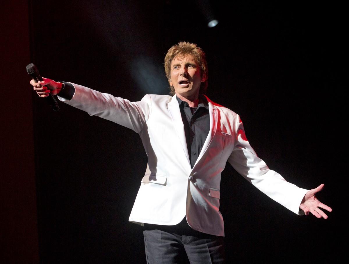 Friends reportedly fear Barry Manilow has been pushing himself too hard after undergoing lung cancer surgery.