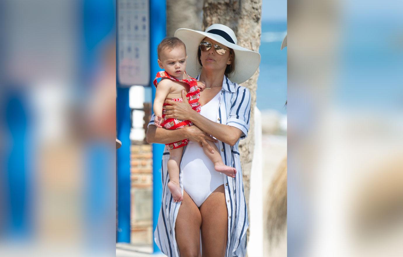 Eva Longoria Wears White Swimsuit On Beach With Baby Son