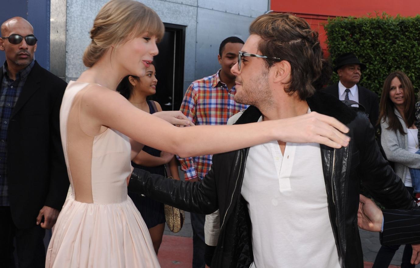 Taylor Swift and Zac Efron at a movie premiere