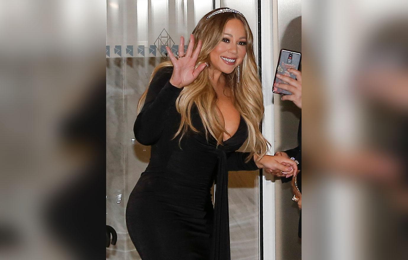 mariah carey jay z roc nation fight denies rumor