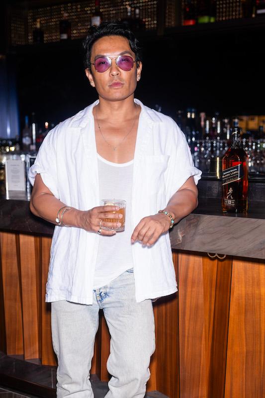 prabal gurung celebrates his spring and summer  new york fashion show by raising a glass of johnnie walker black label