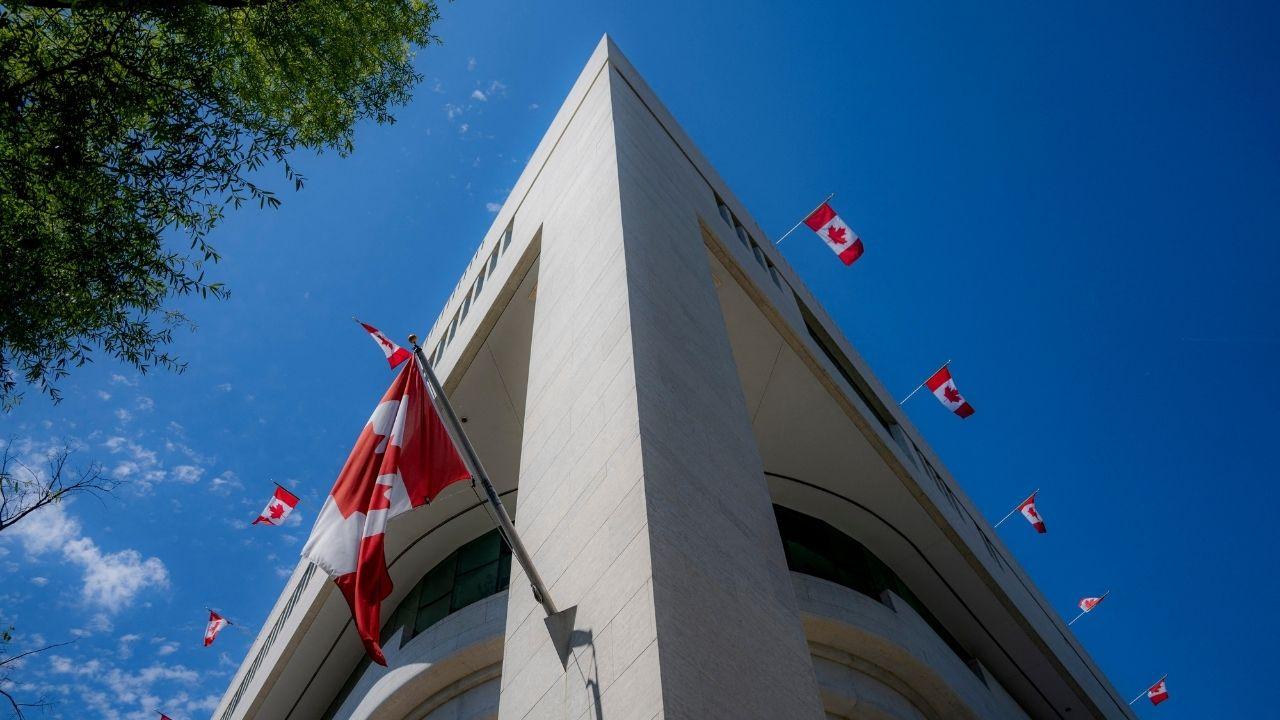 Photo of a building with Canadian flag