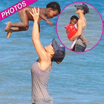 Jillian Michaels and her daughter, Lukensia enjoy the surf on Miami Beach  during Veteren's Day Featuring