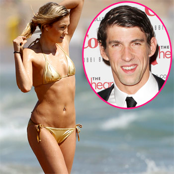 Michael Phelps parties with bikini-clad beauty following his split with  model girlfriend