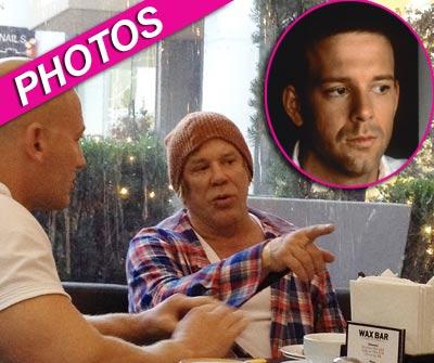 //mickey rourke bruised bandaged splash