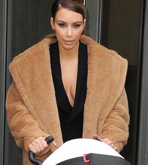 Kim Kardashian Is Boob-A-Licious In A Revealing Black Plunging Neckline