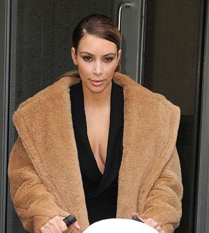 Kim Kardashian Is Boob-A-Licious In A Revealing Black Plunging Neckline