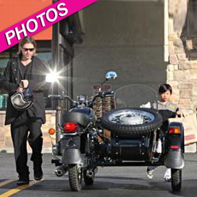 //brad pitt pax motorcycle gelsons shopping