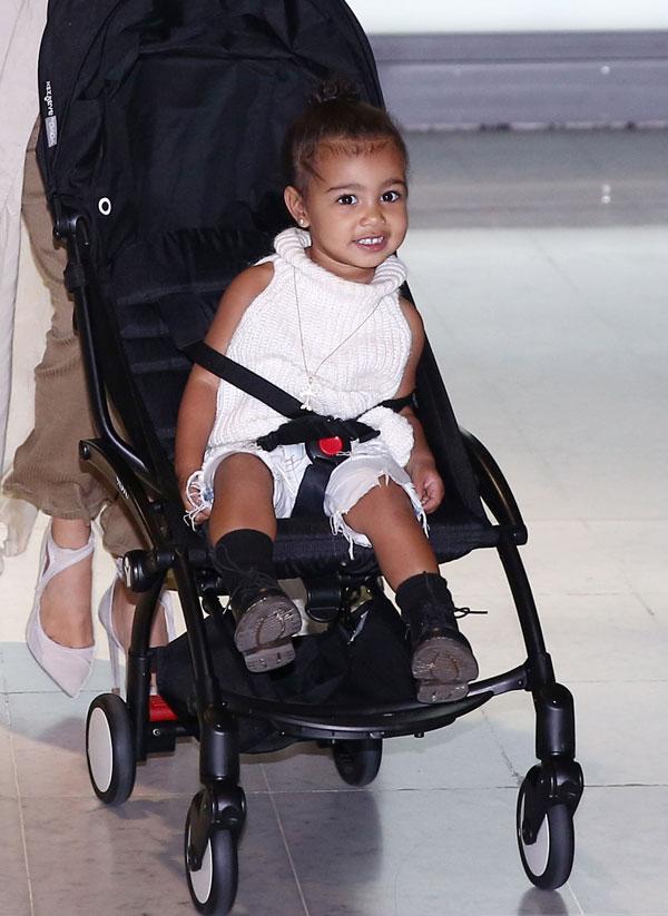 Kim Kardashian Kanye North West Photos -- Toddler Smiles As Family Arrives In Paris