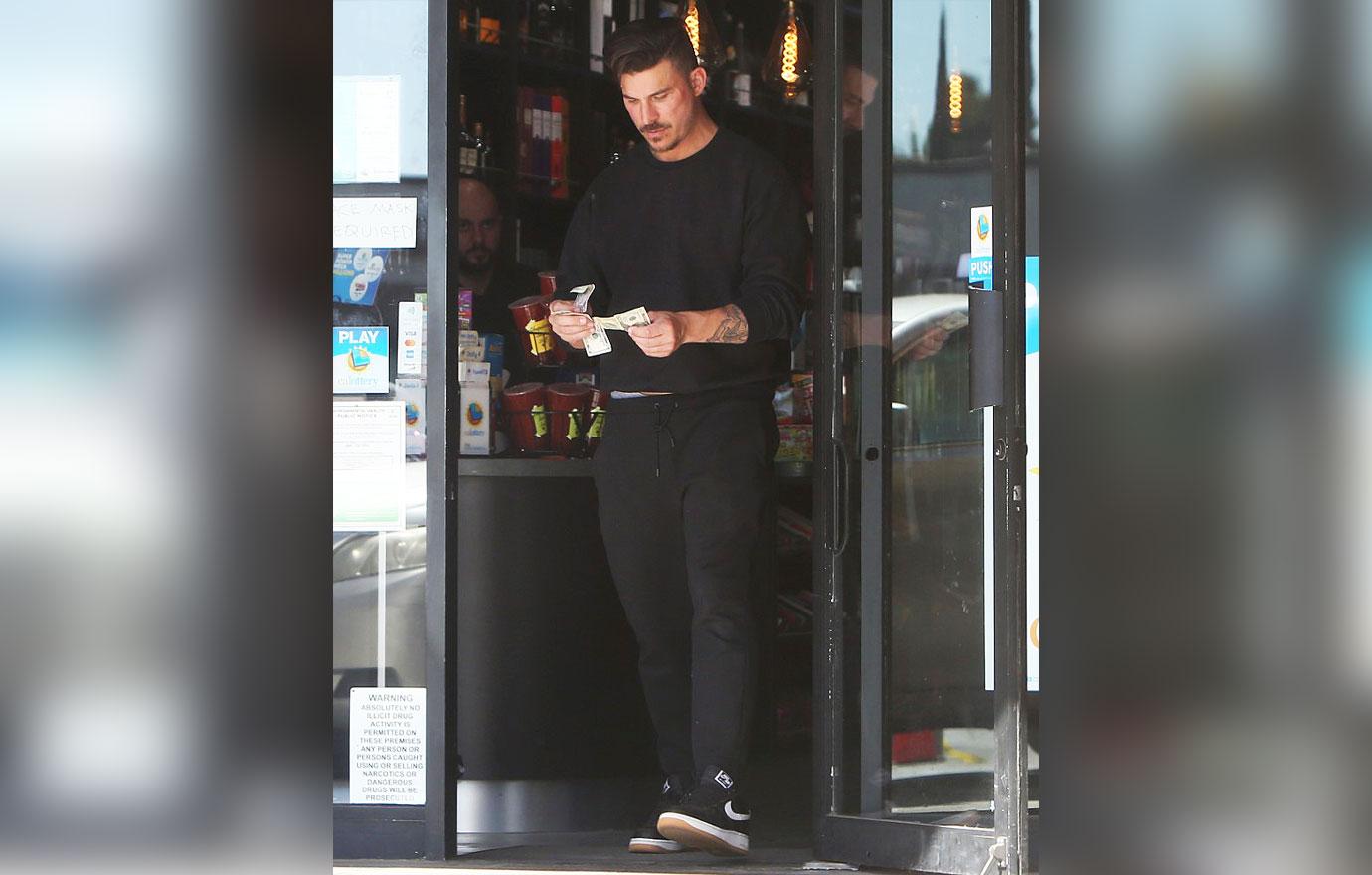 vanderpump rules jax taylor counting money liquor store photos fired taxes