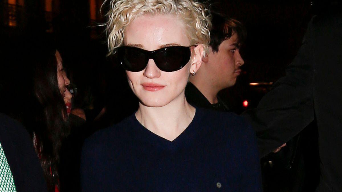 Julia Garner remains attached to portray Madonna as the singer revives her long-delayed biopic project.